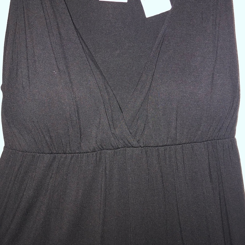 Super soft and stretchy black strapping dress.